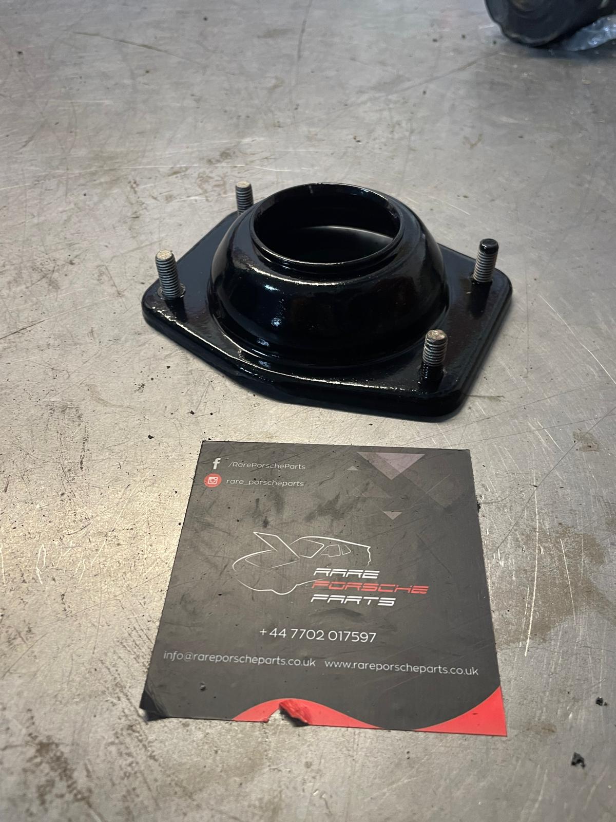 Porsche 924 / 944 front suspension bearing flange, 477412345, refurbished