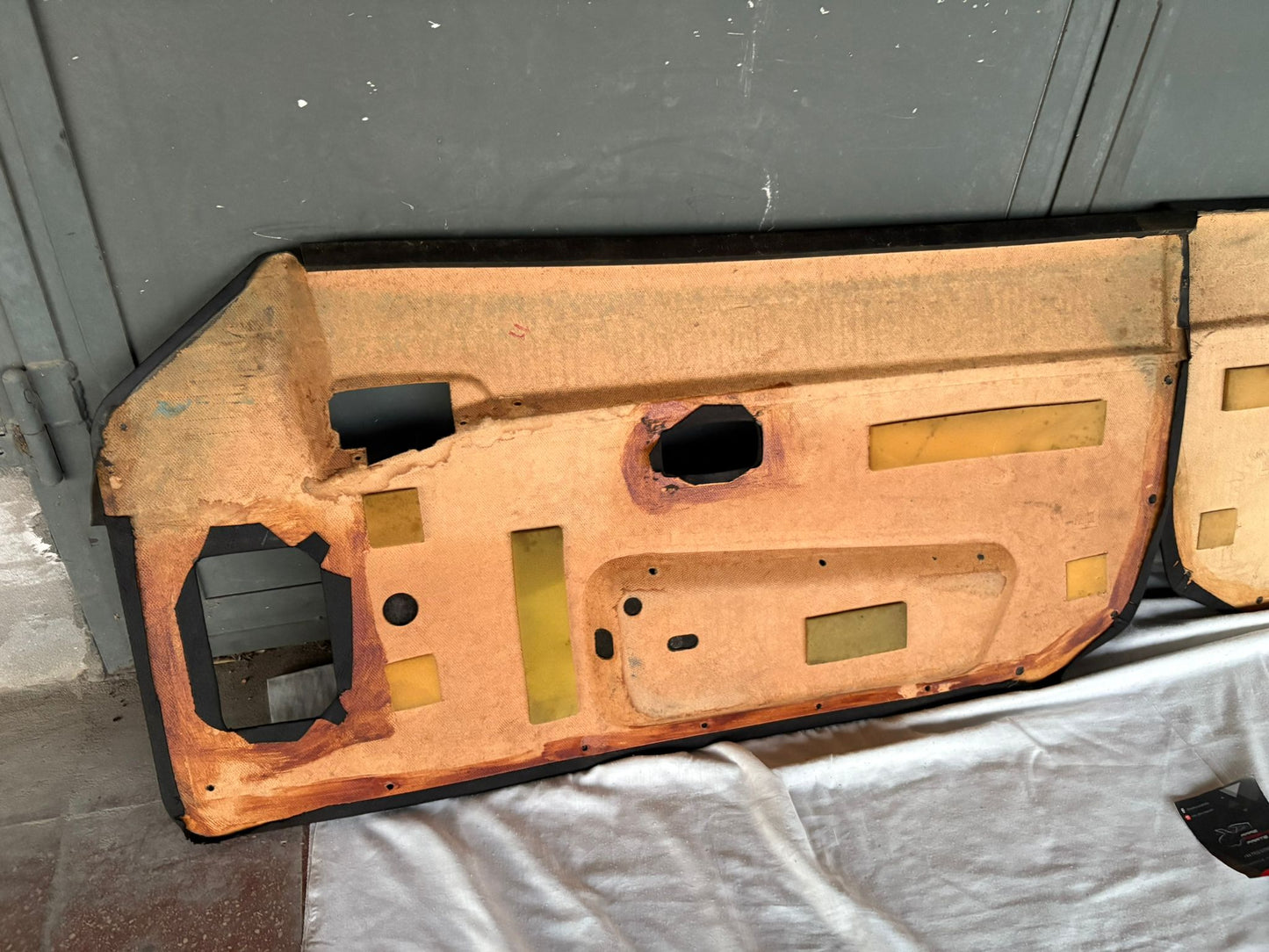 Pair Of Porsche 944 black/black Porsche scripted fabric door cards 94455501701 / 94455501801 used, very nice condition.