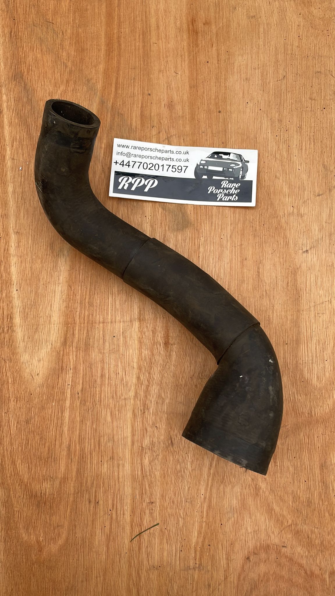 Porsche 944 1985-91 Radiator hose 94410623707 from water pump to radiator bottom, used