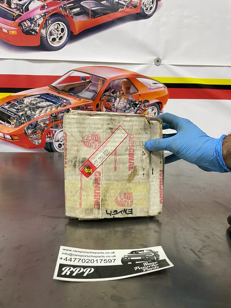 Porsche 944 left front headlamp, new 477941771B