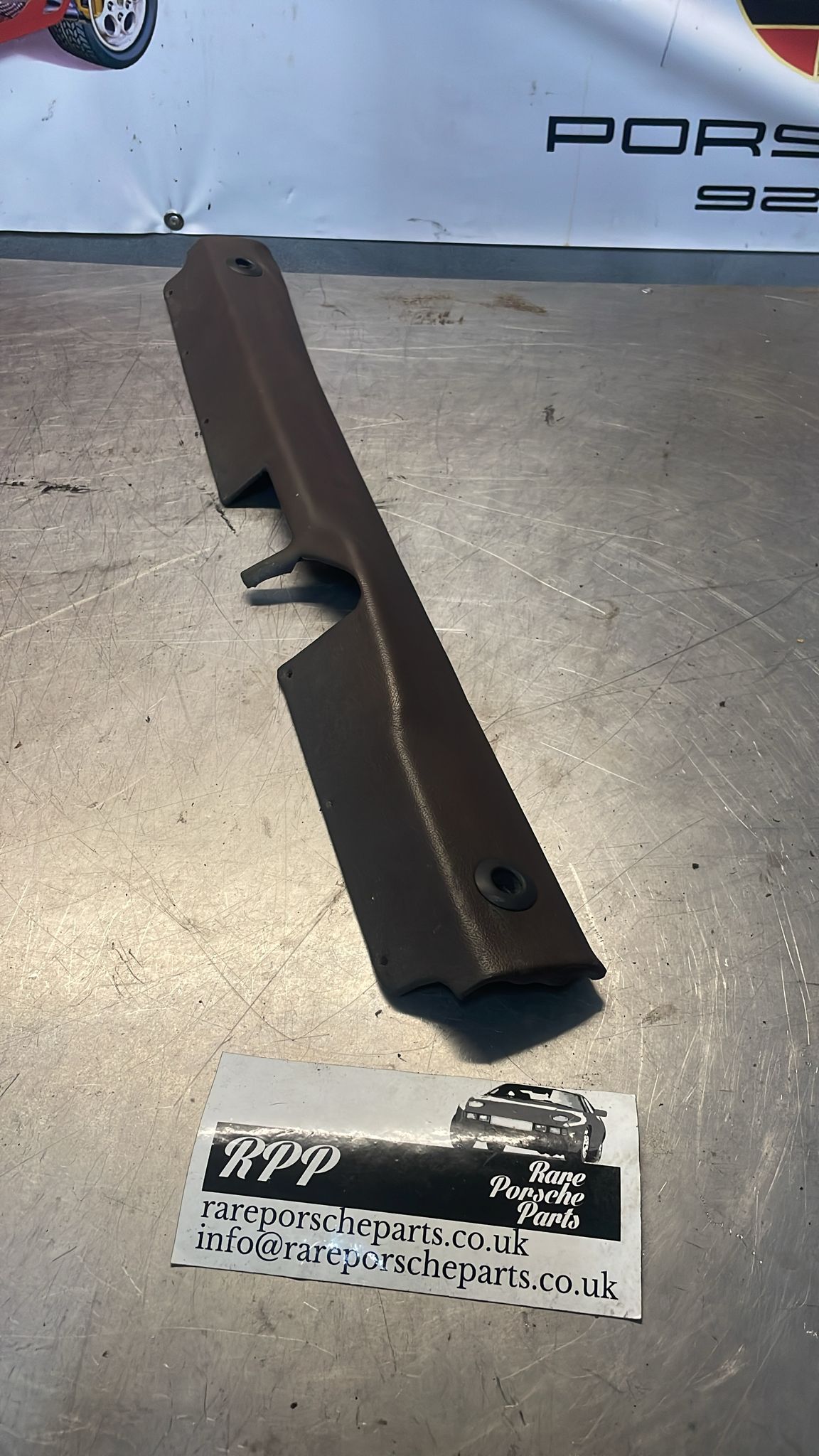 Porsche 928 trunk trim panel, used, brown, 92855165302
