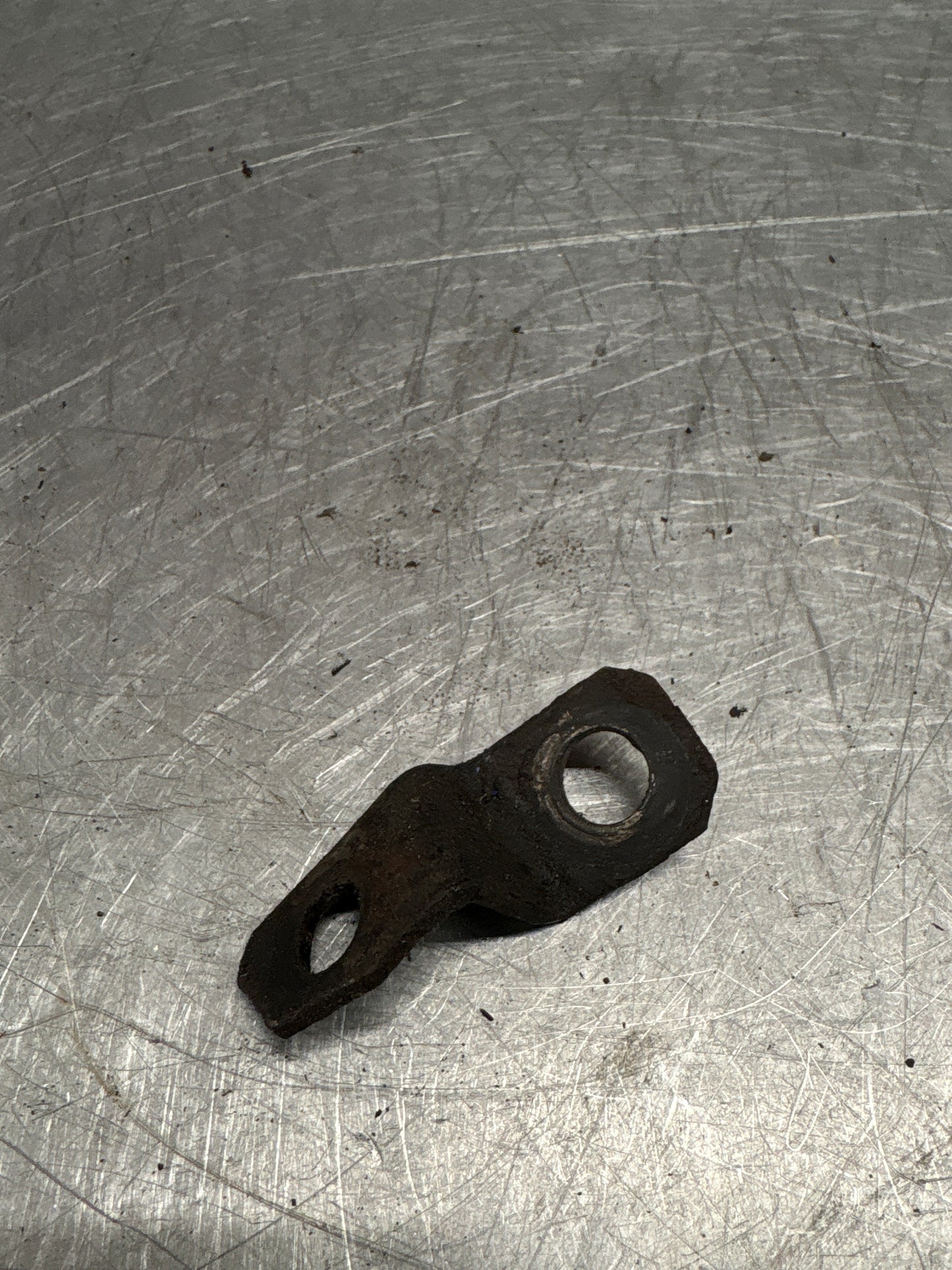 Porsche 944 exhaust manifold bracket, used 94411016501
