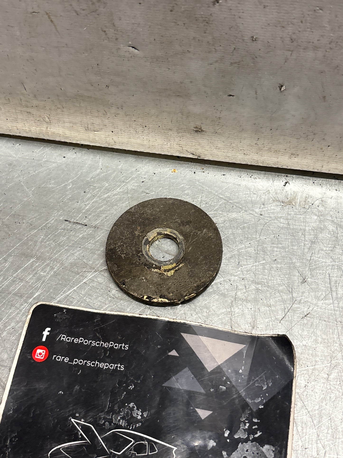 Porsche 928 wishbone bearing pin plate, used 92833164700