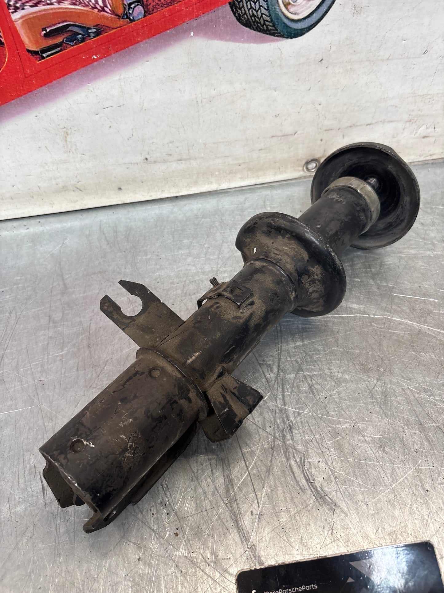 Porsche 944 Front left shock absorber, used 95134303112