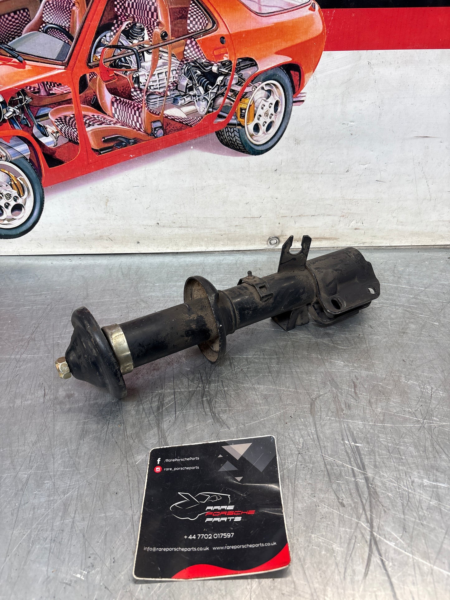 Porsche 944 Front left shock absorber, used 95134303112