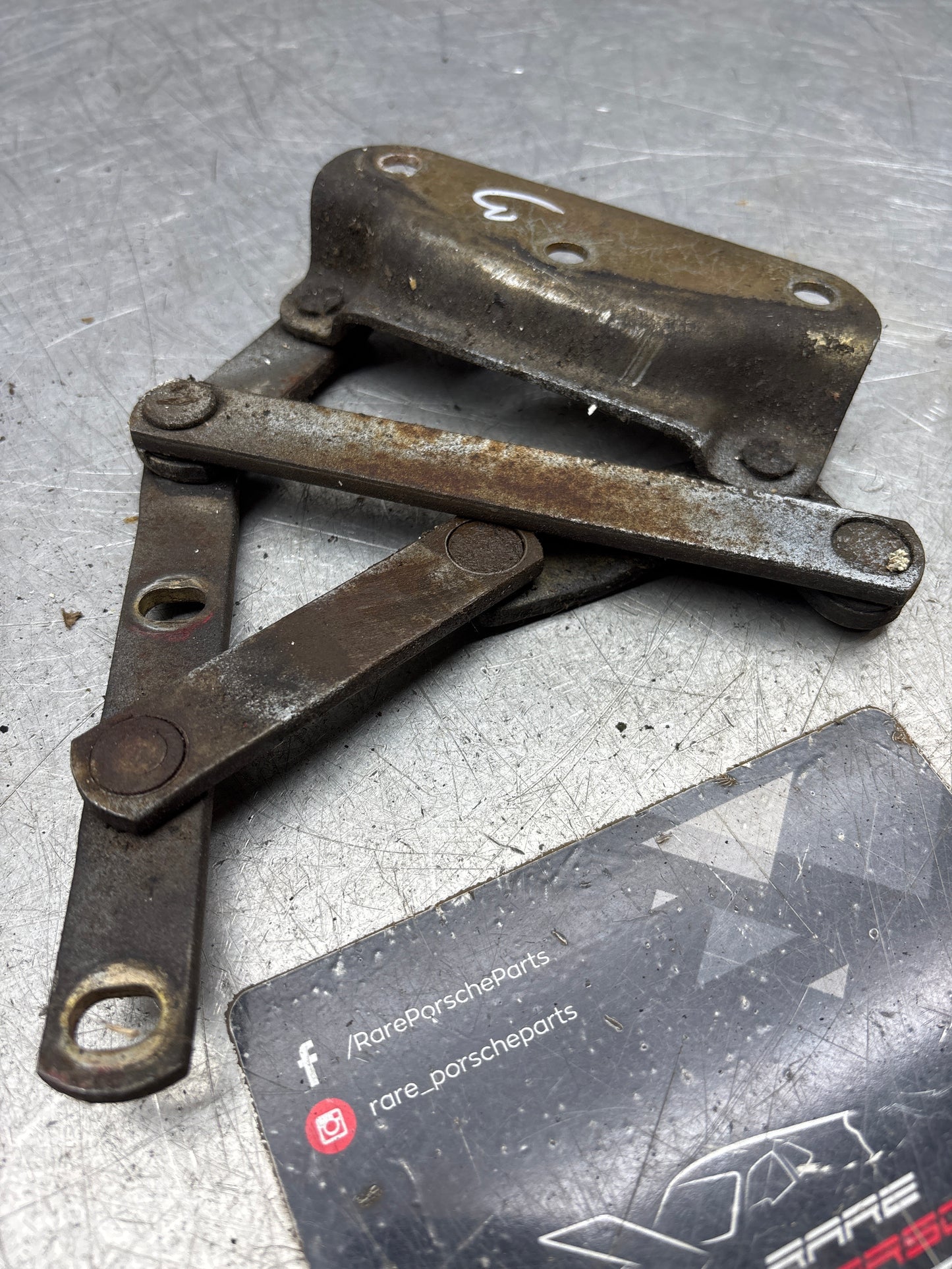 Porsche 928 left hand side bonnet hinge, used 92851104104