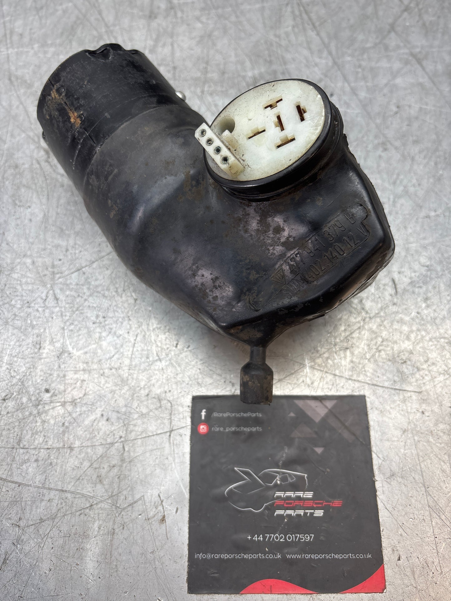 Porsche 924/944 headlight lift motor 477941379B, used