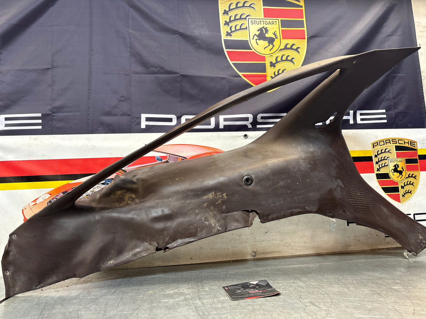 Porsche 928 early left side lower side trim panel, without loudspeaker, burgundy used 92855502102
