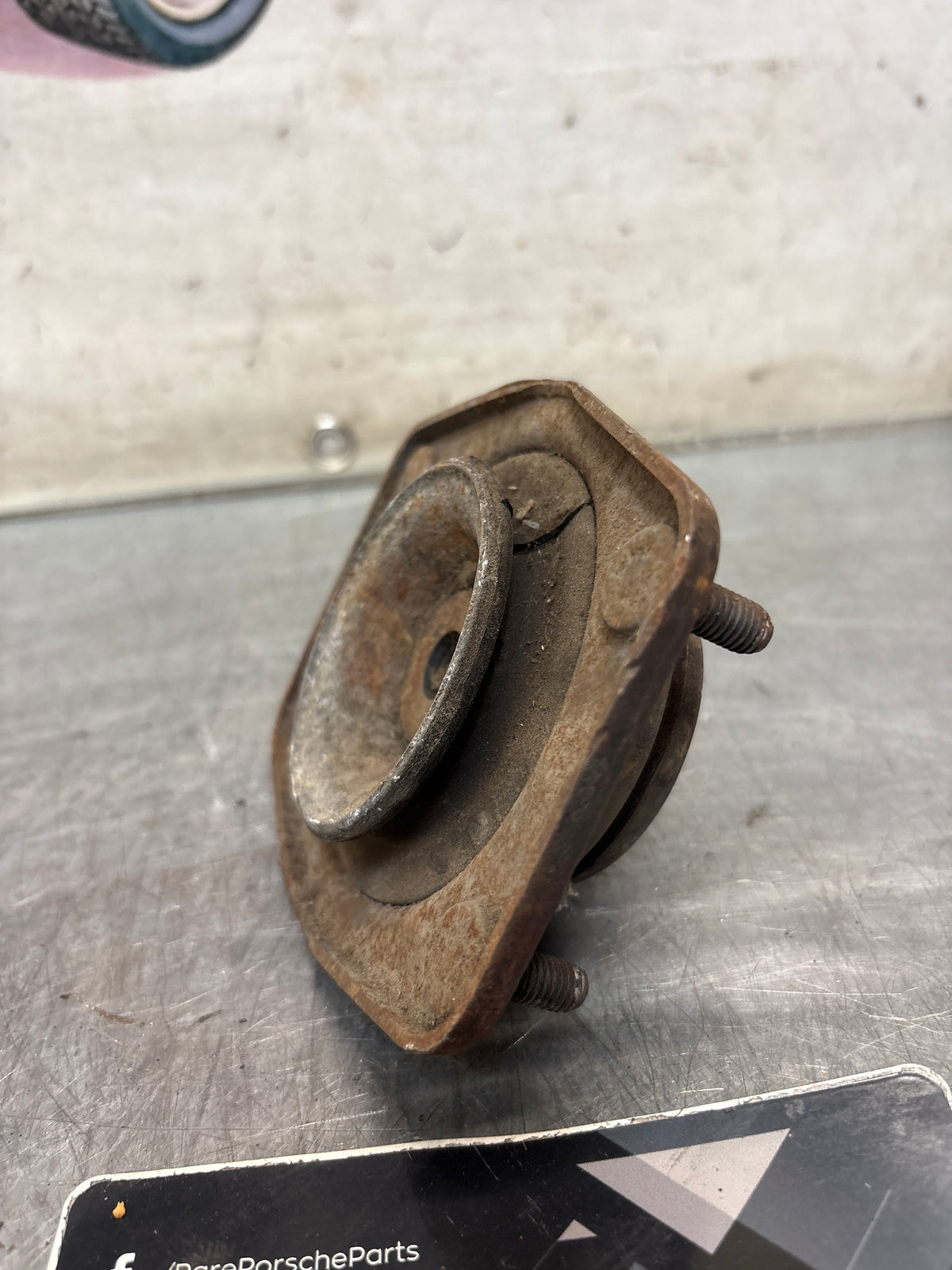 Porsche 924 / 944 front suspension bearing flange, 477412345, used