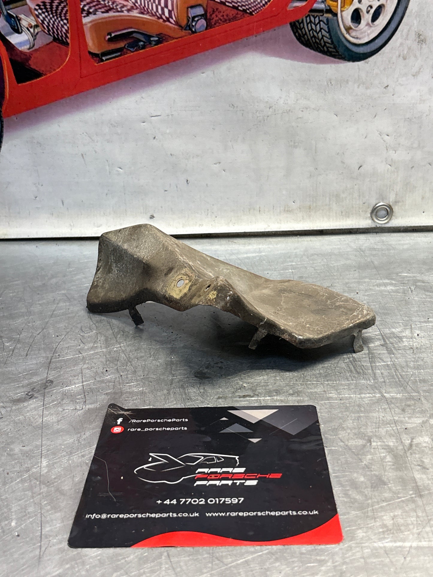 Porsche 928 82- mount cover heat shield plate left side, used 92837506701