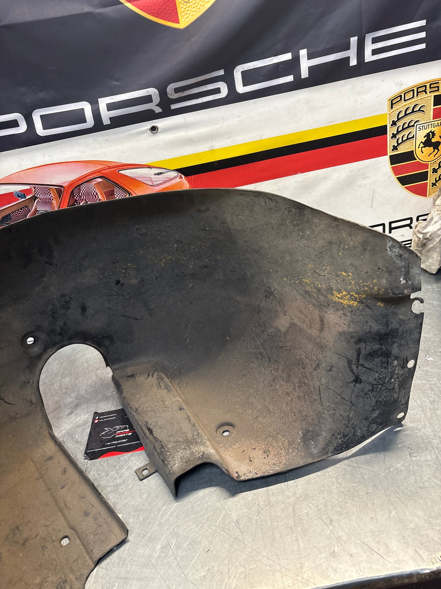 Porsche 944 from 85.5 wheel arch liner  Left, 94450438101 Used