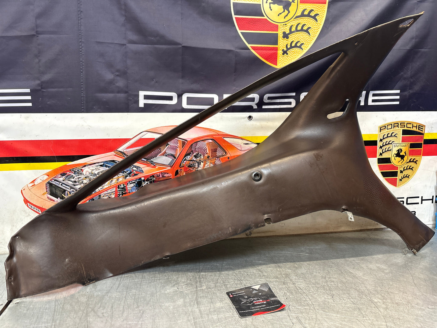 Porsche 928 early left side lower side trim panel, without loudspeaker, brown used 92855502102
