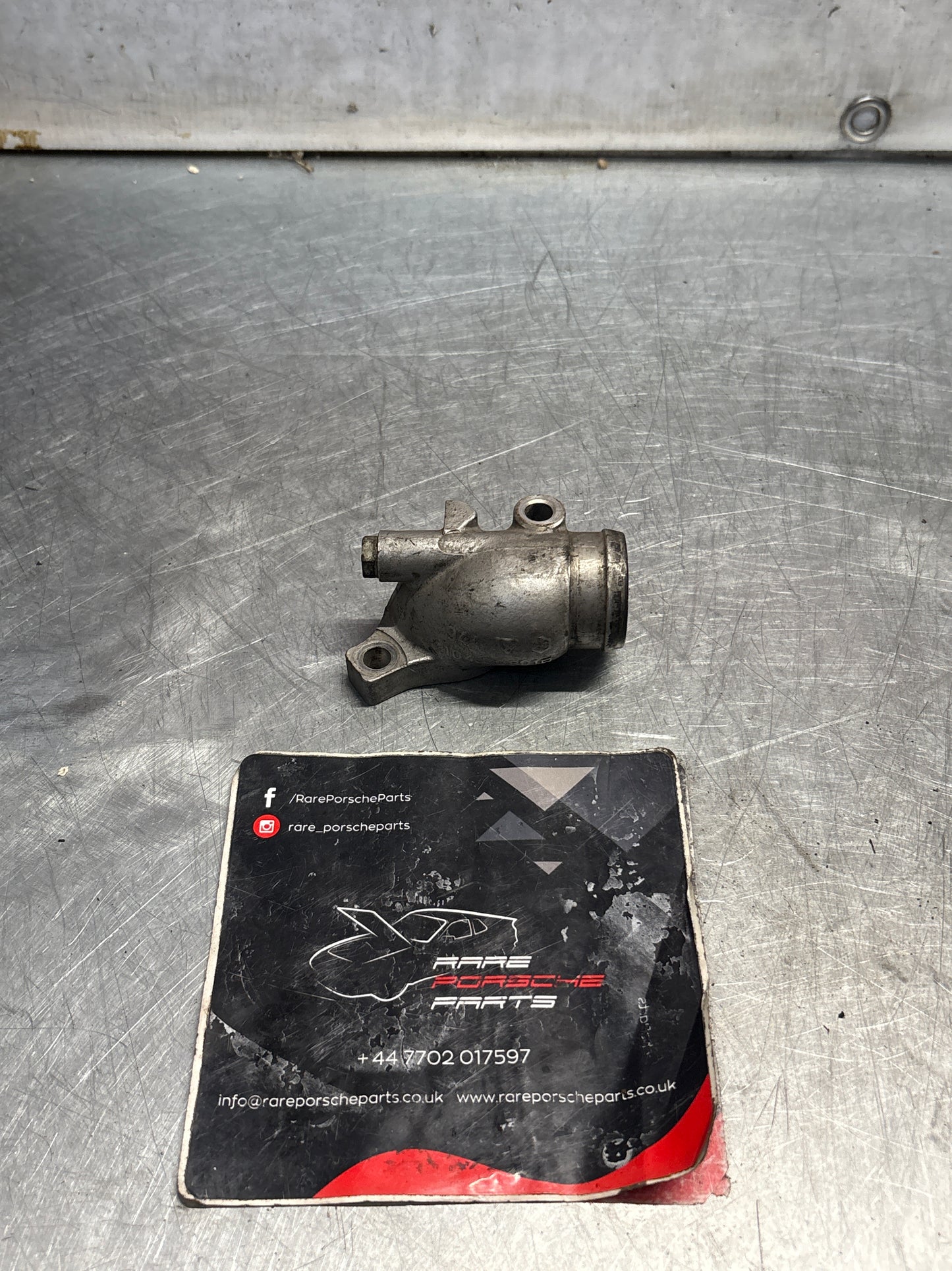 Porsche 944S water cooling neck, used 94410430801 / 94410430801R