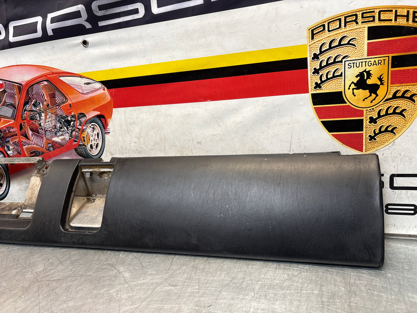 Porsche 911 964 dashboard lower knee protection trim, black leather, used 96455207304 / 96455207300