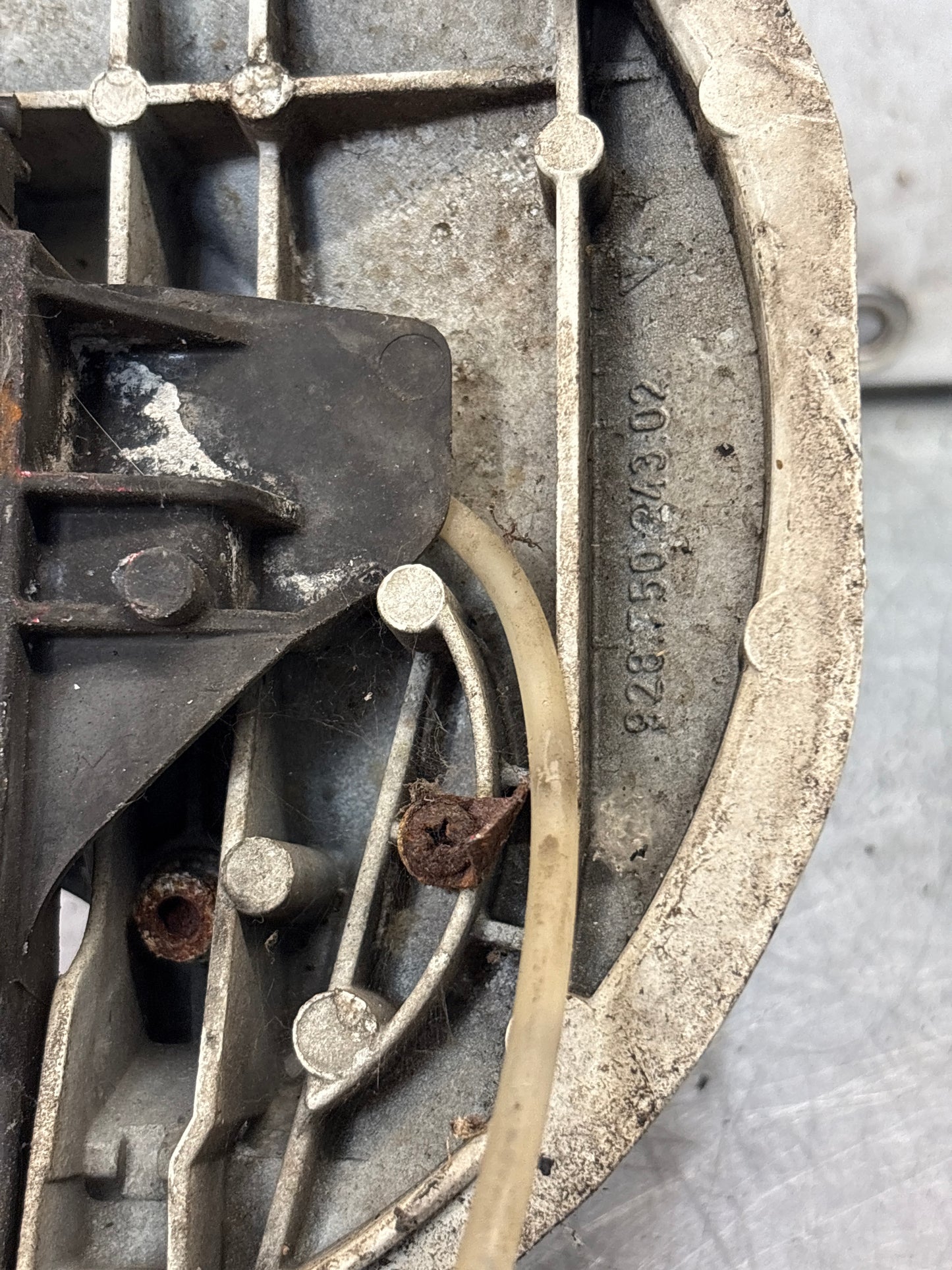 Porsche 928 left headlight swivel frame 92875024902 92875024302 used