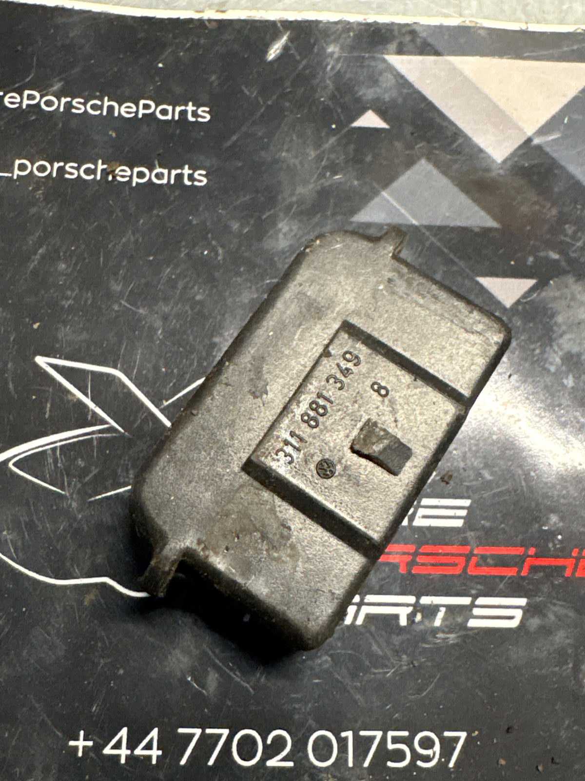 Porsche 914 seat rail end plug, used 311881349
