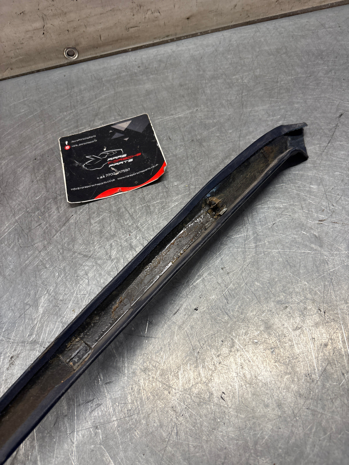 Porsche 928 right, off side door upper frame surround trim, marine blue 92855502602, used