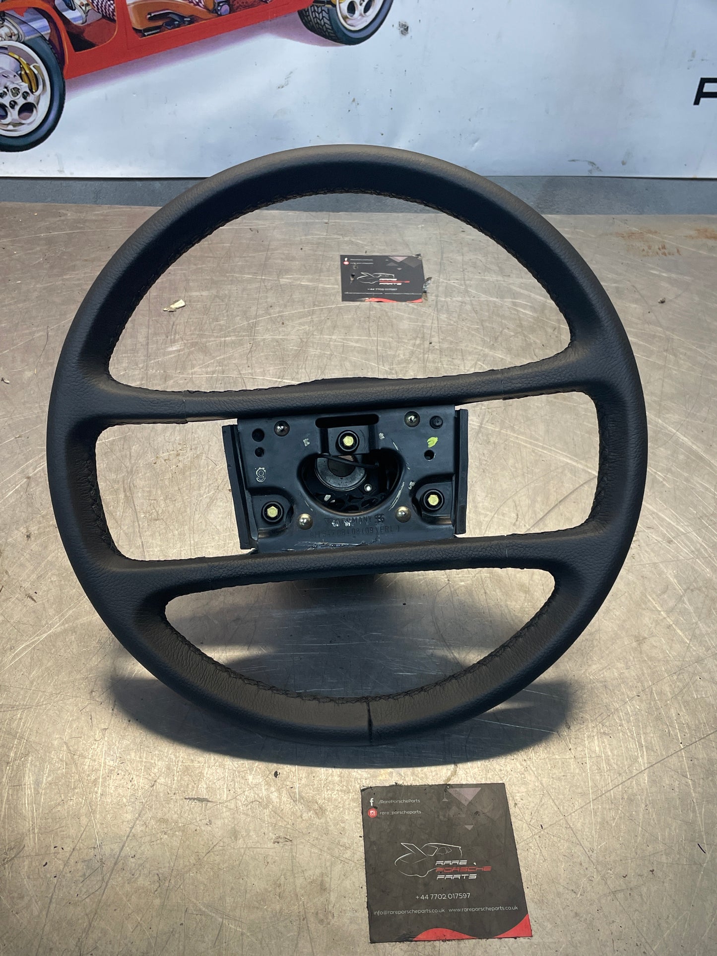 Porsche 911 930 black leather steering wheel, refurbished 91134708408