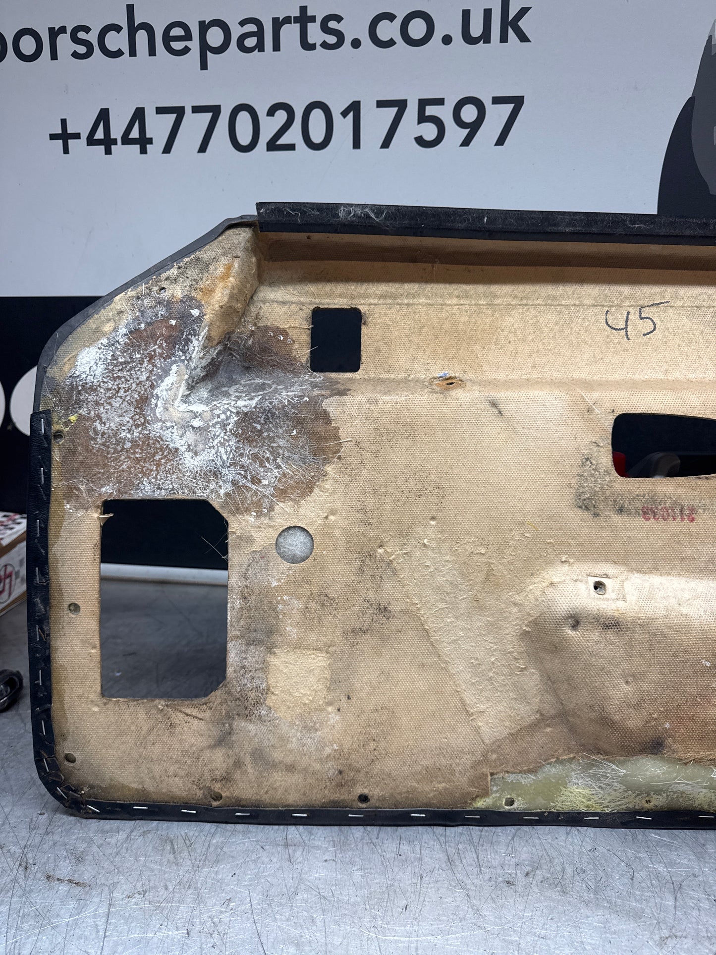 Porsche 924/ Early 944 black RHD Left door card. Fibreglass repaired. 477867012