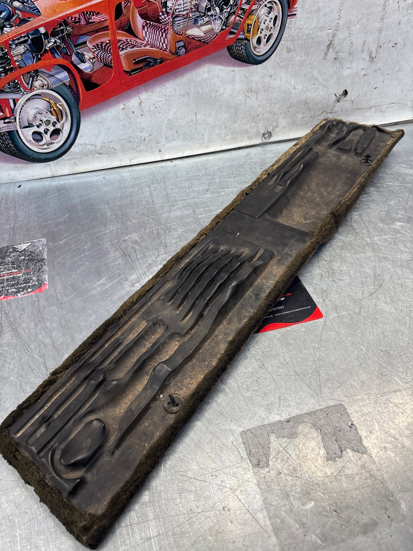 Porsche 928 black carpeted Tool kit panel cover, used 92855118105