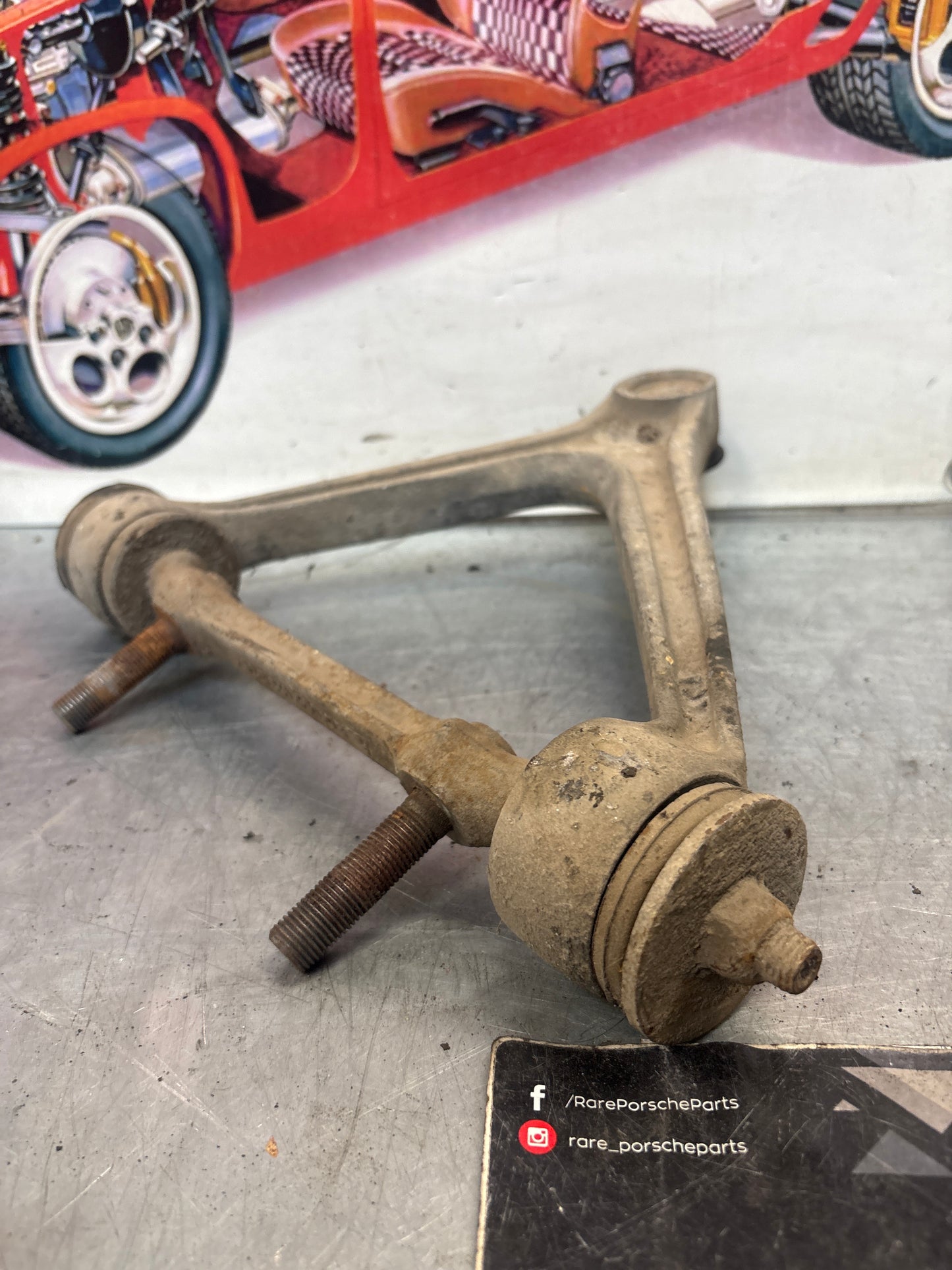 Porsche 928 front upper left control arm, used 92834145722