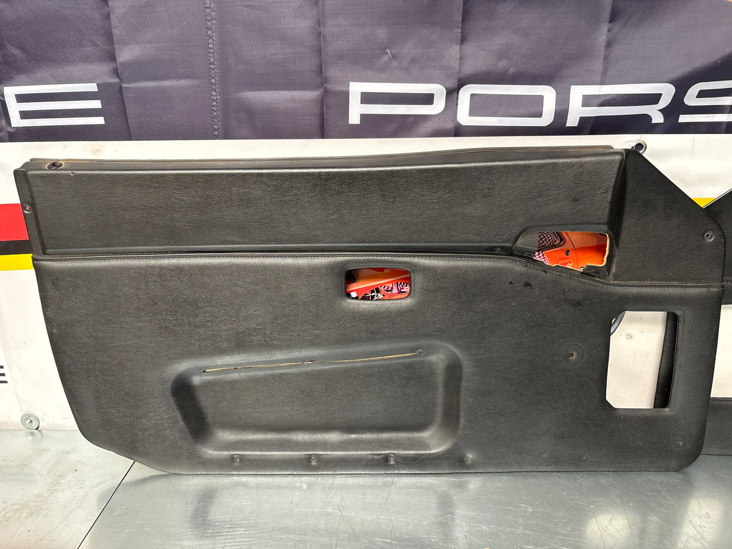 Porsche 944 pair of Used black door cards, 94455501801 / 94455501701