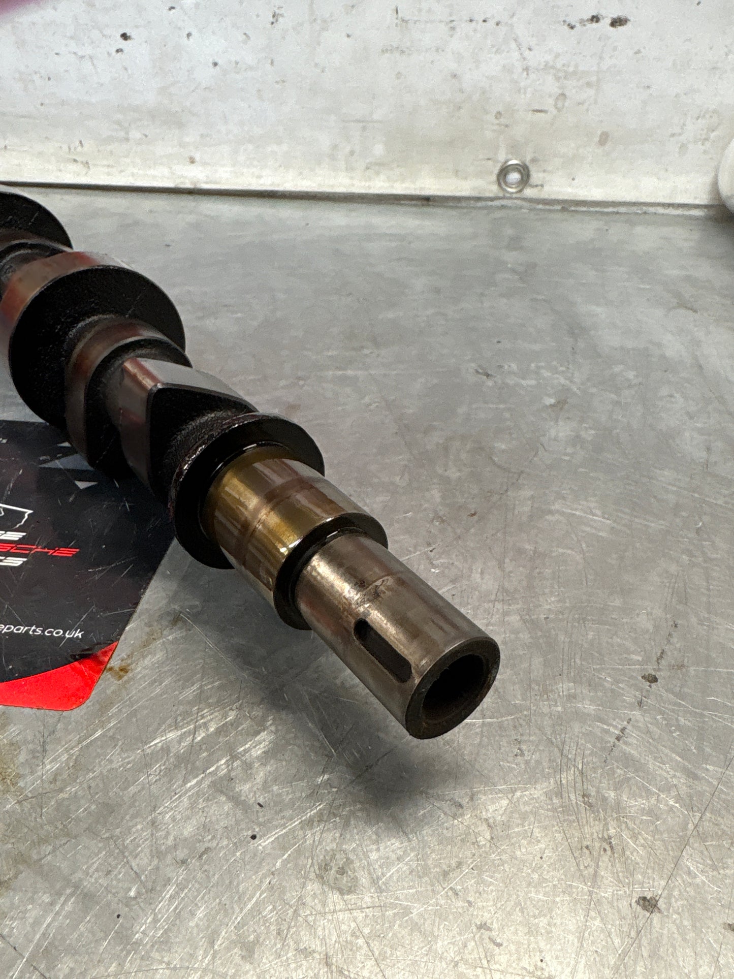 Porsche 928 cam shaft, used 9281052030R