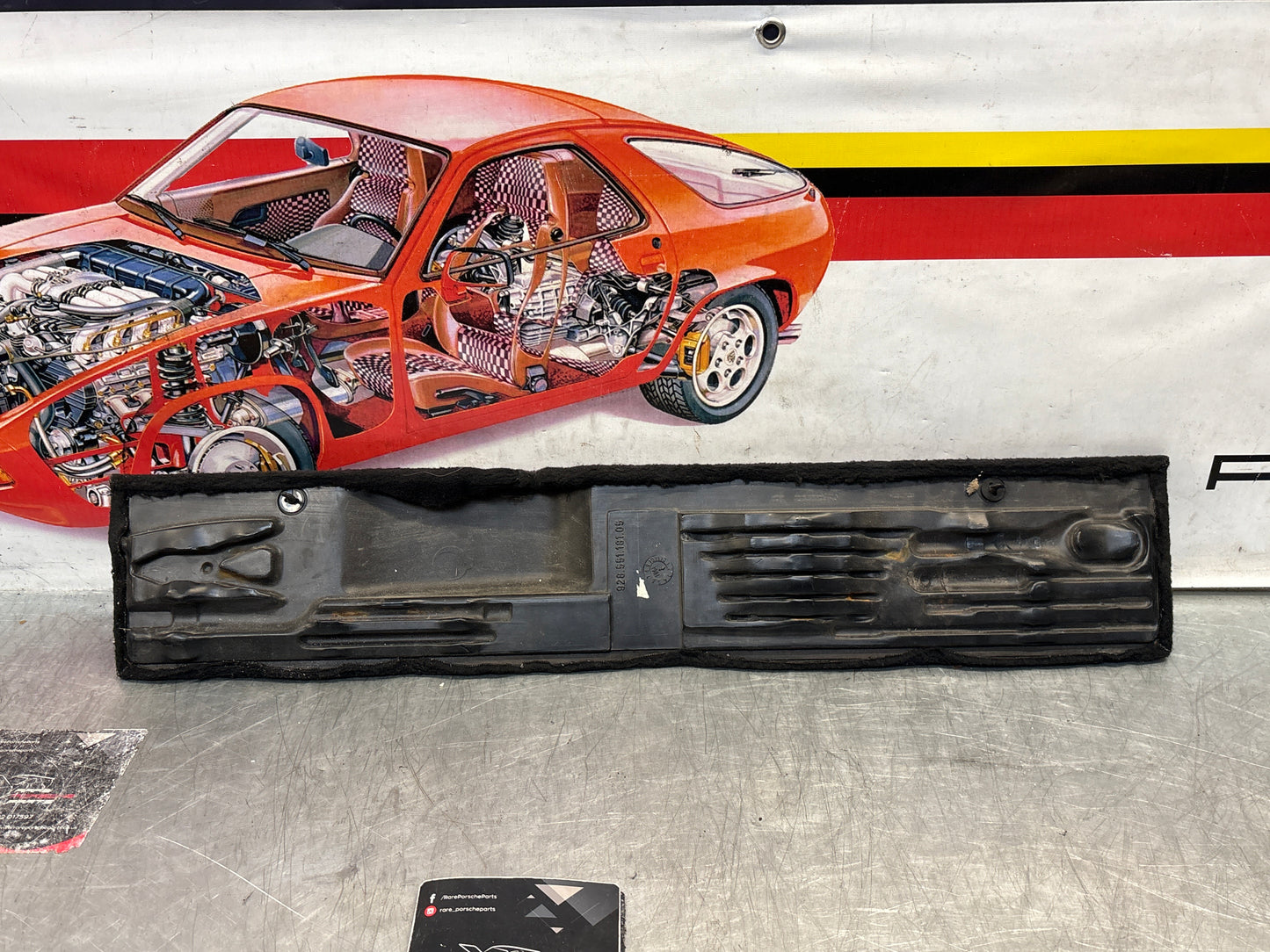 Porsche 928 black carpeted Tool kit panel cover, used 92855118105