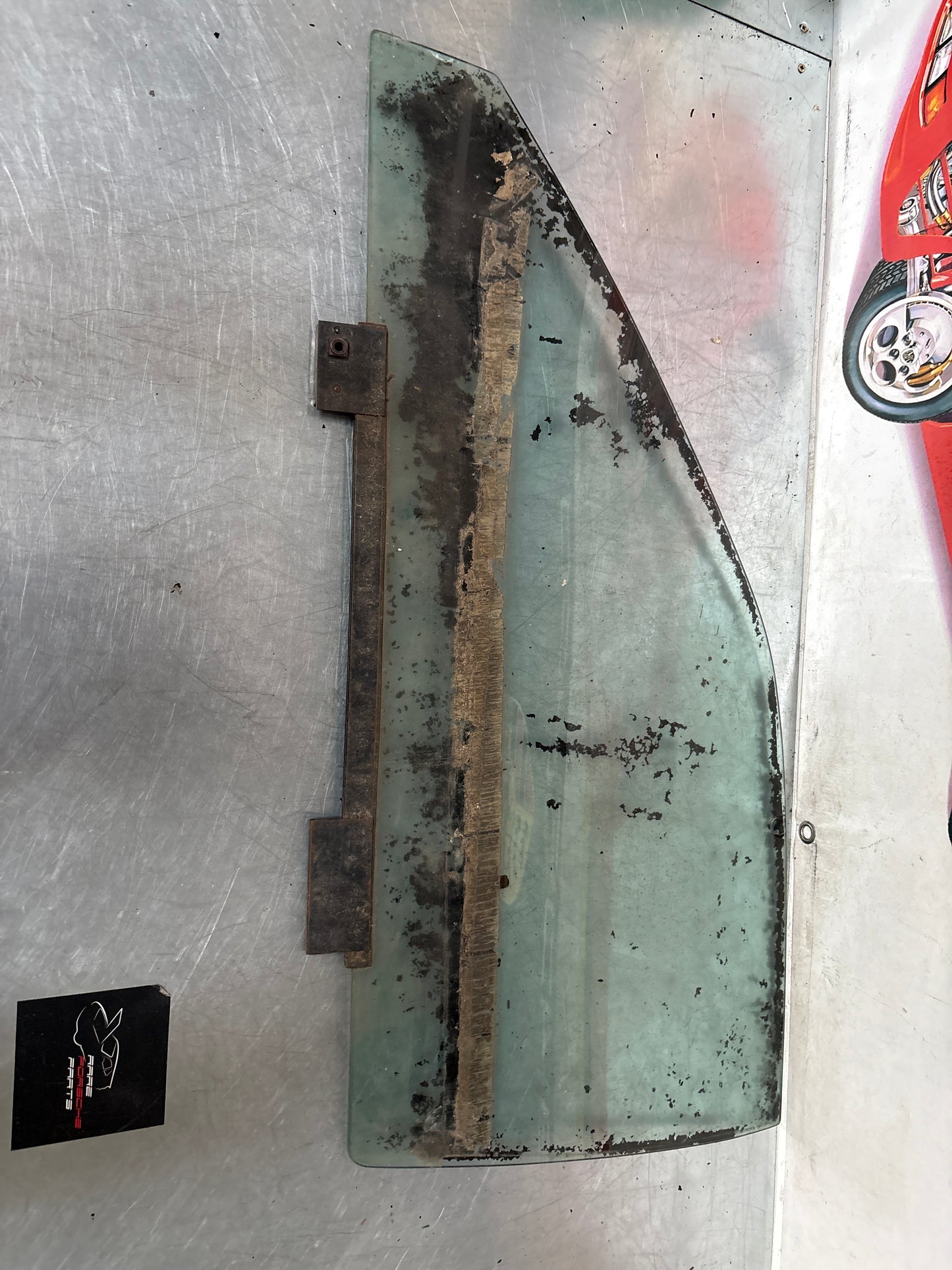 Porsche 944 Left side door glass, tinted green used 94454202301