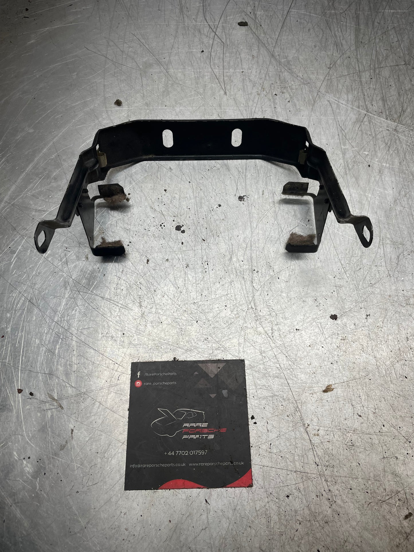 Porsche 944 center console bracket, refurbished 94455206702