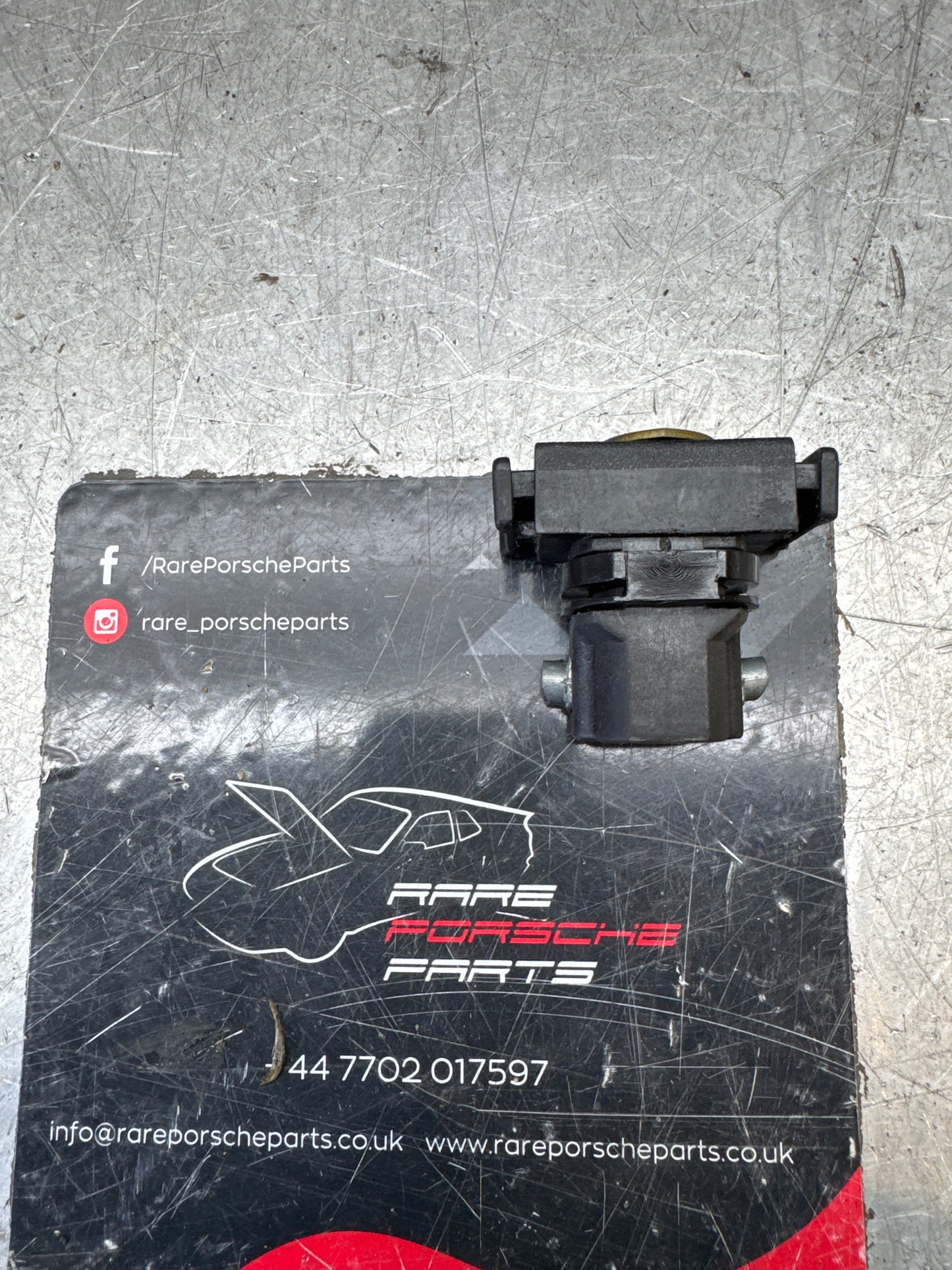 Porsche 924/944 black glove box lock with badge 477857133 used immaculate