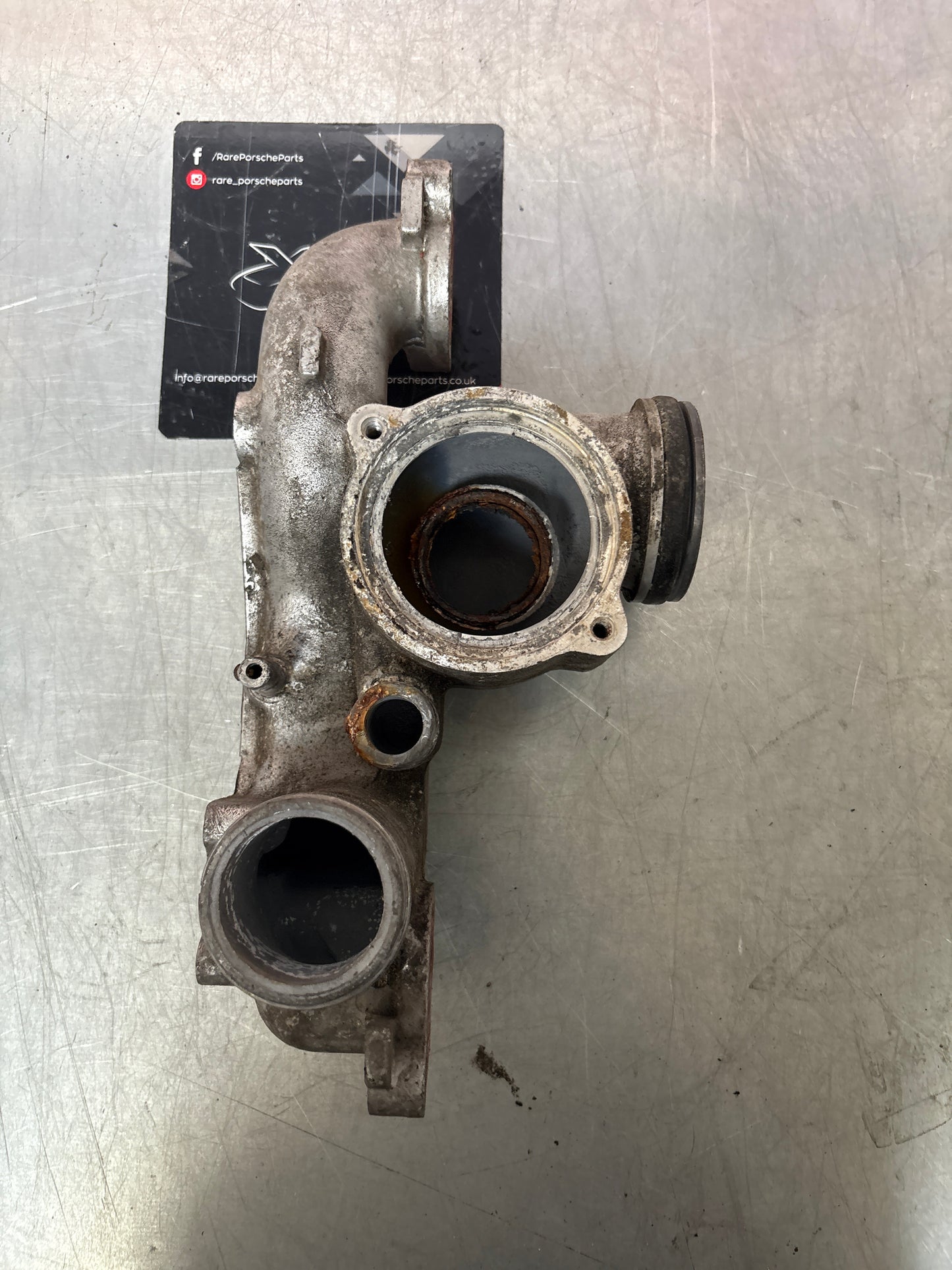 Porsche 928 thermostat housing, used 9281061652R