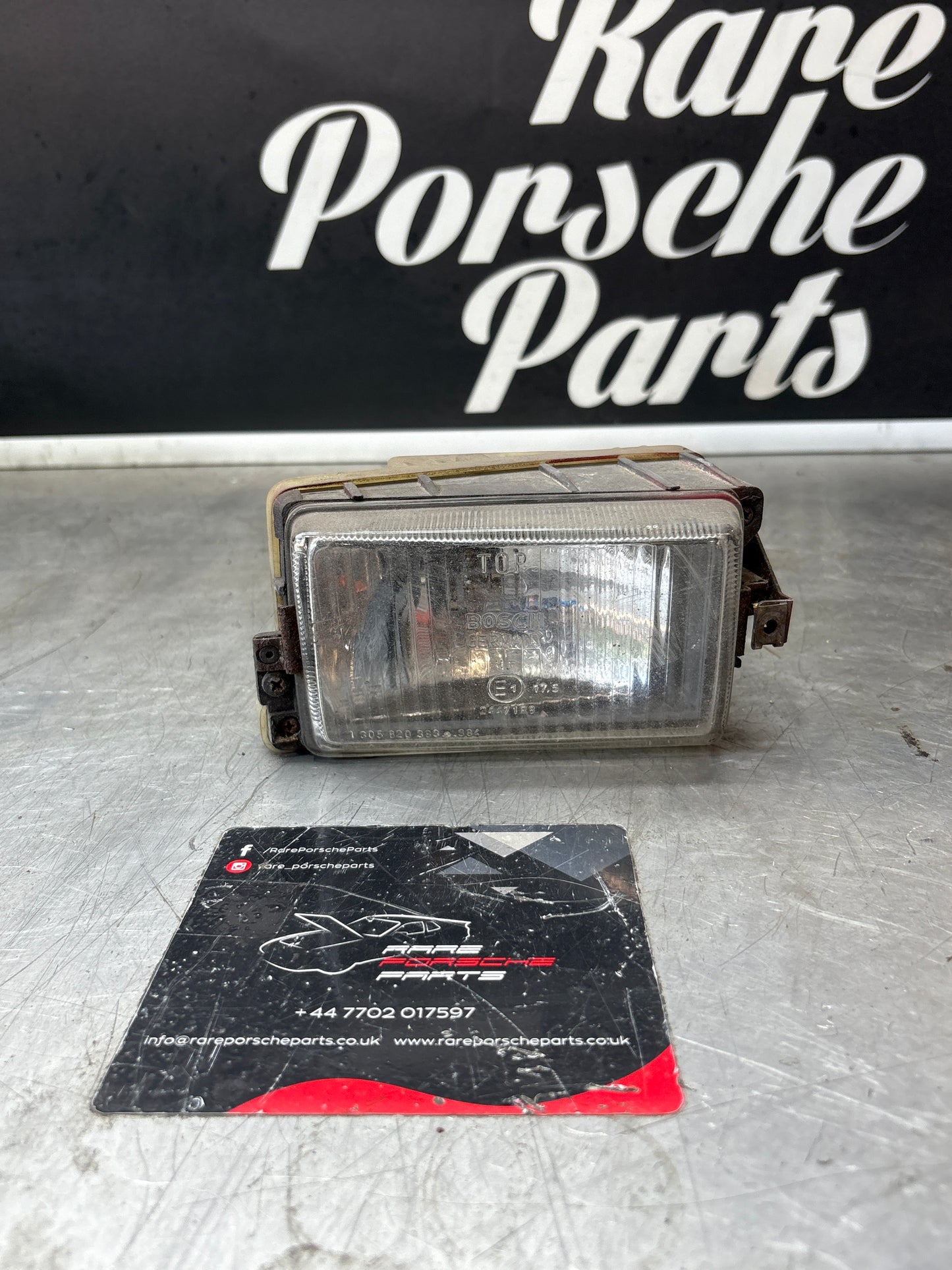 Porsche 928 Bosch headlight high beam, left 0306403001 / 92863141401
