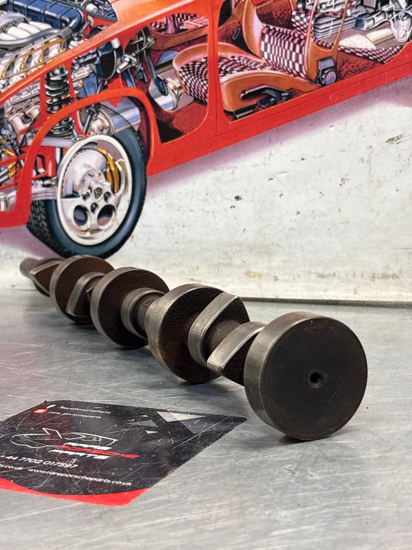 Porsche 928 cam shaft, used 9281052040R