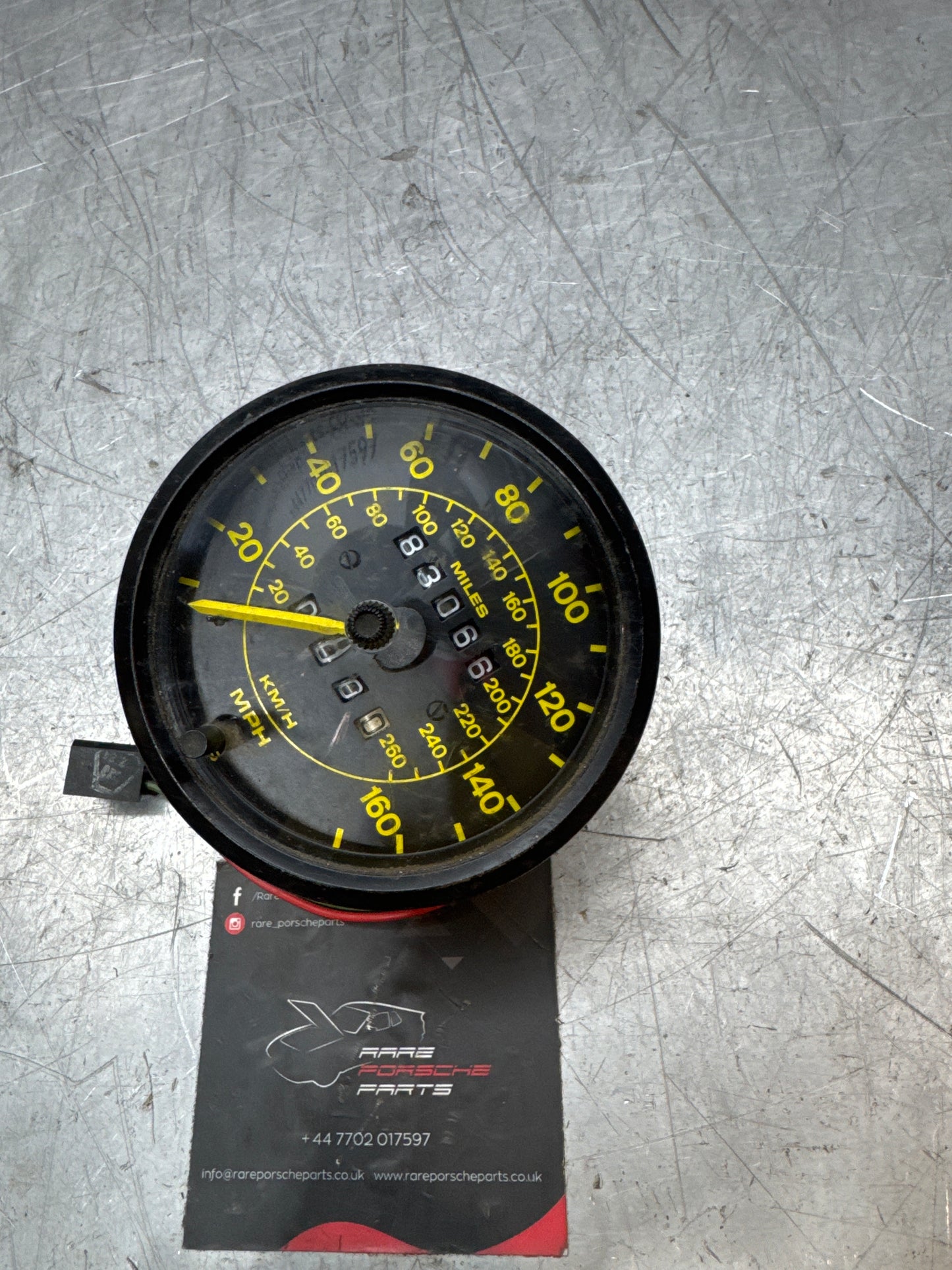 Porsche 944 speedometer showing 83066 miles 94464103600 spares or repair