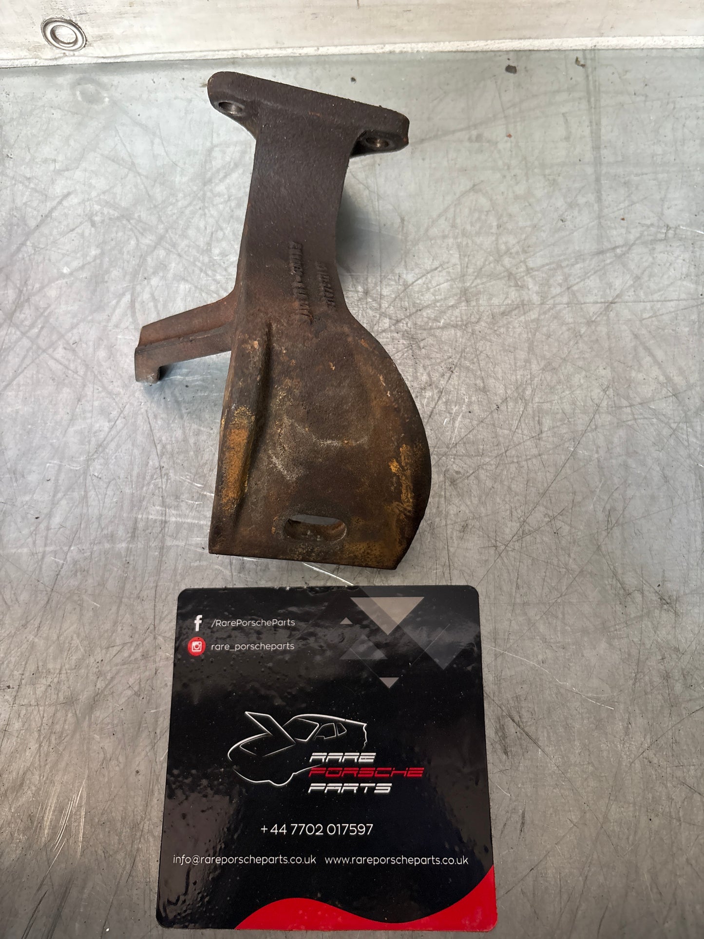 Porsche 924 Turbo engine bracket right side, used 93137512400