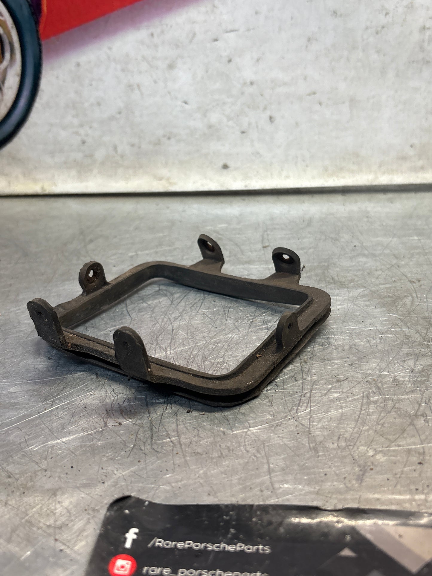 Porsche 928 rear fog light frame, left, used 92850528502