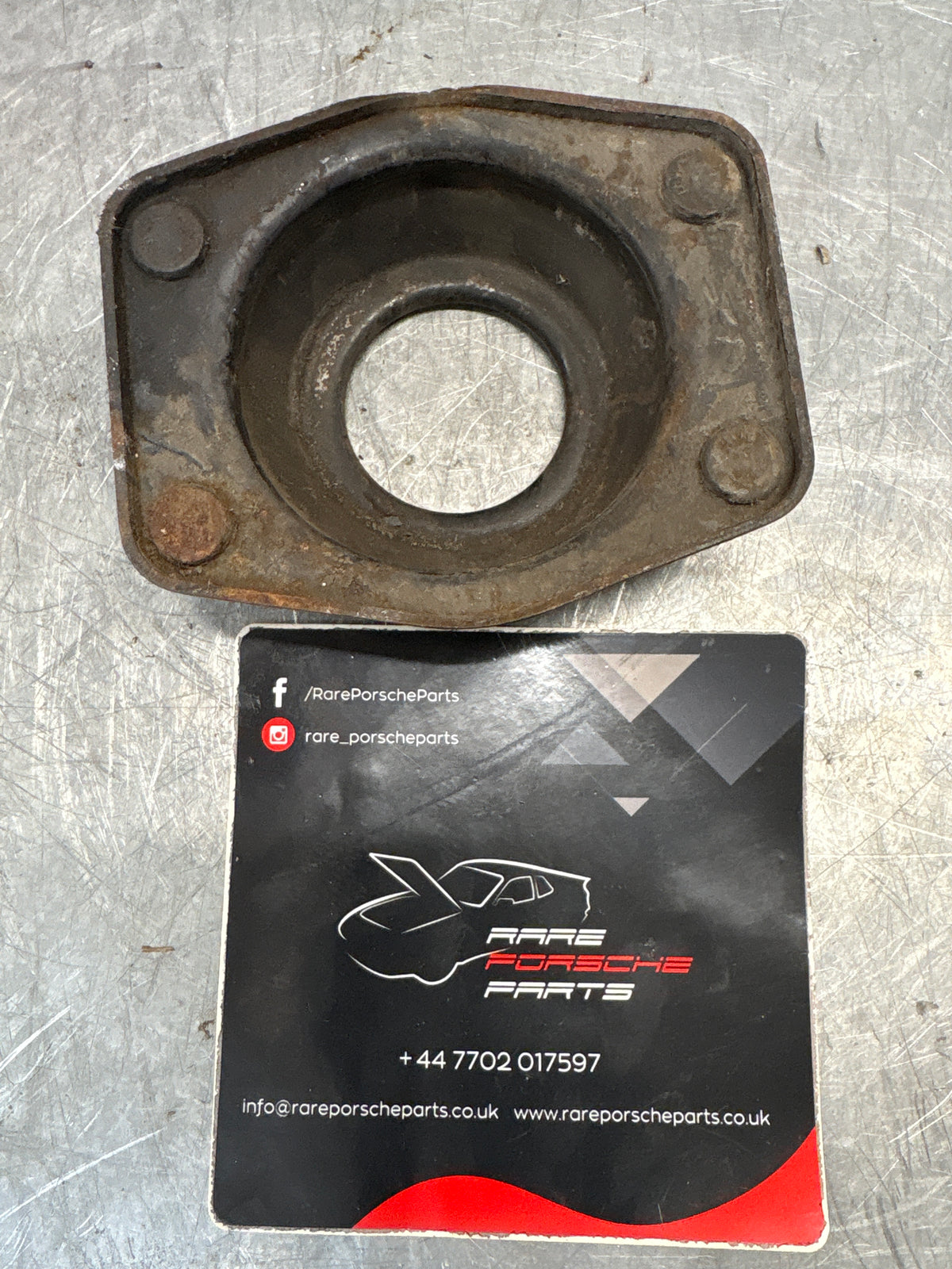 Porsche 924 / 944 front suspension bearing flange, 477412345, used