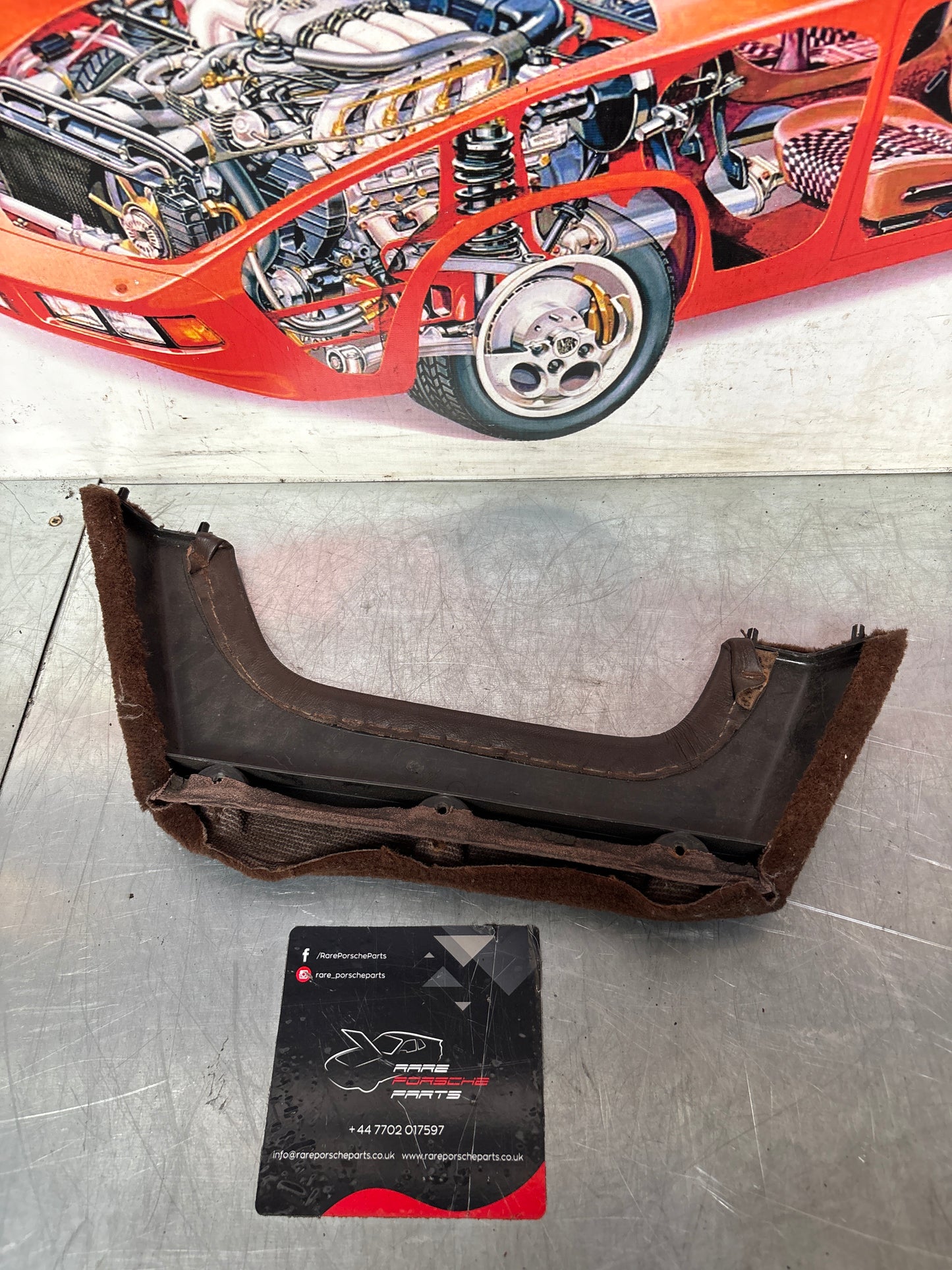 924/944 Left, Passenger side brown carpeted door pocket, used 477867133