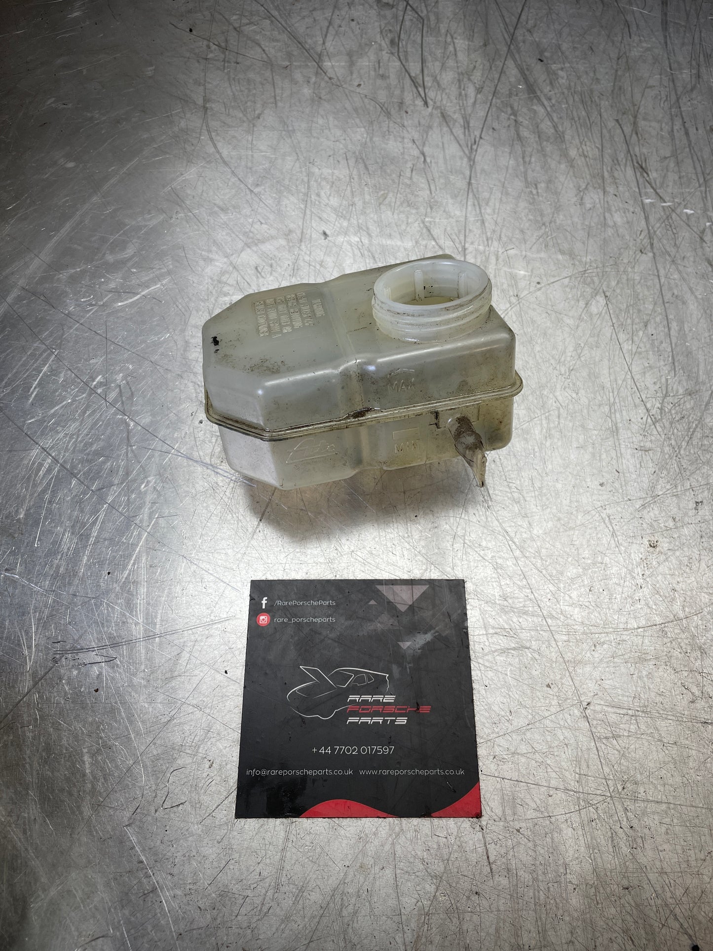 Porsche 924 (80-85) 924S (86-88) 944 (82-85) Brake fluid reservoir, used 477611303B