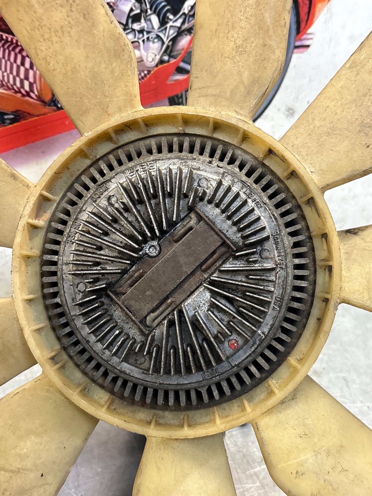 Porsche 928 late engine cooling fan clutch with bracket, used 92810611205 / 92810613701 / 9281061104R