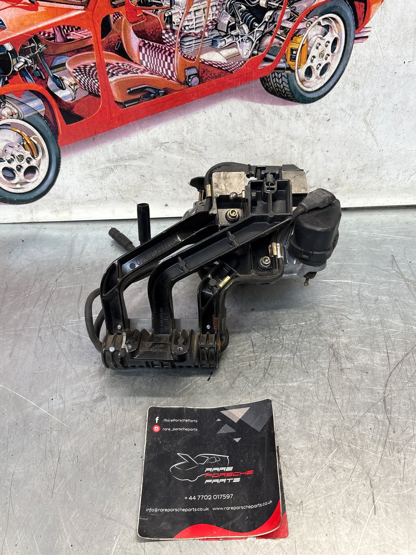 Porsche 968 right headlight swivel frame, for spares or repair 94475057200 / 94475057400 / 94475037800