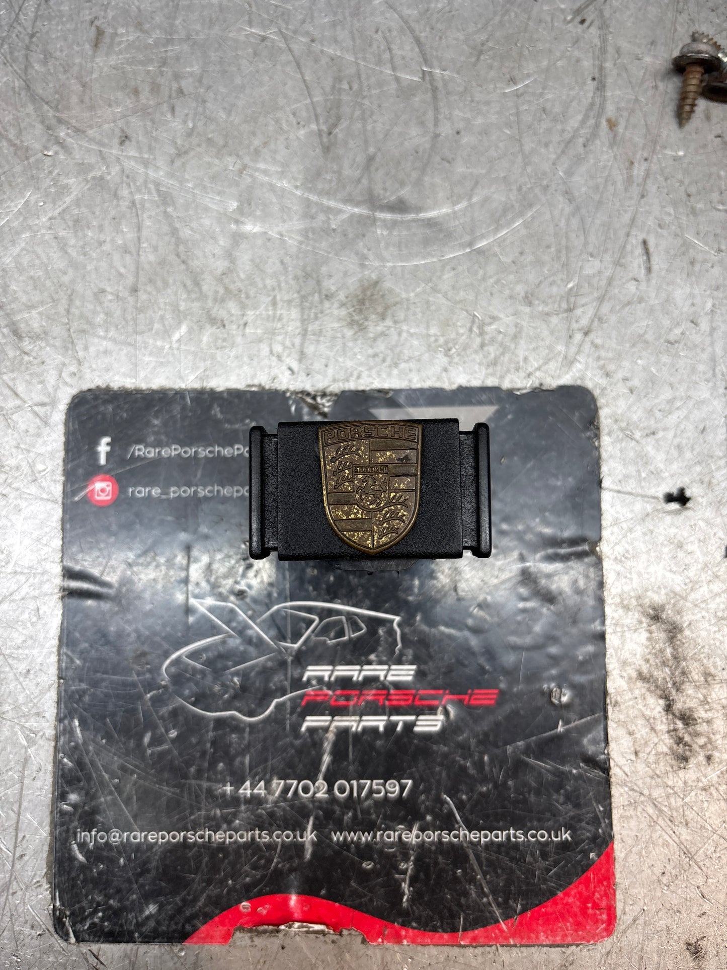 Porsche 924/944 black glove box lock with badge 477857133 used immaculate