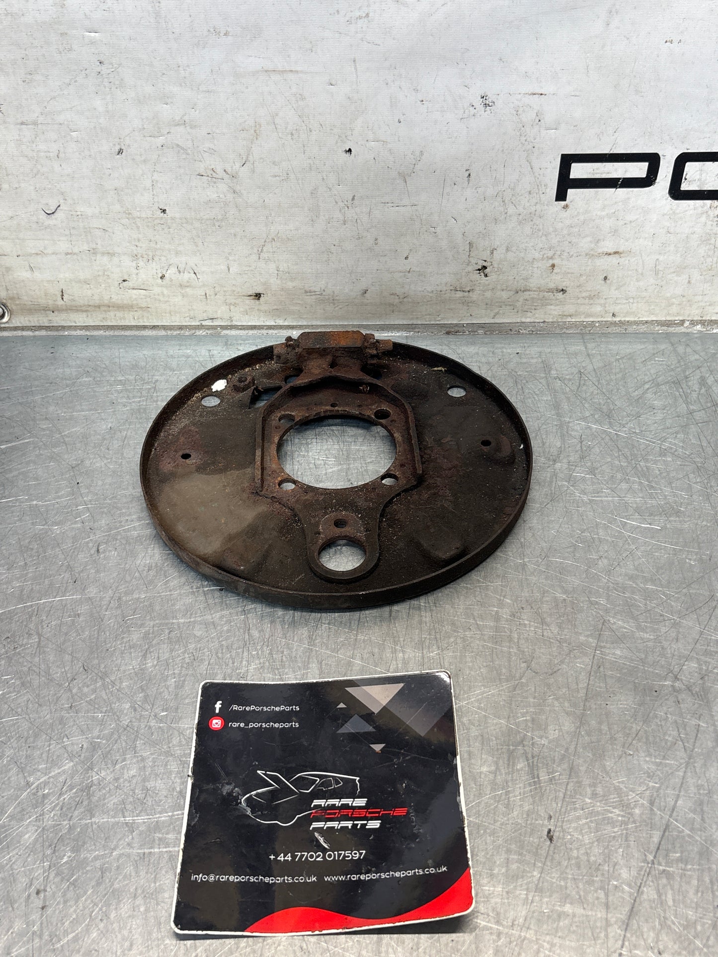 Porsche 924 rear right brake dust shield, used 113609440E