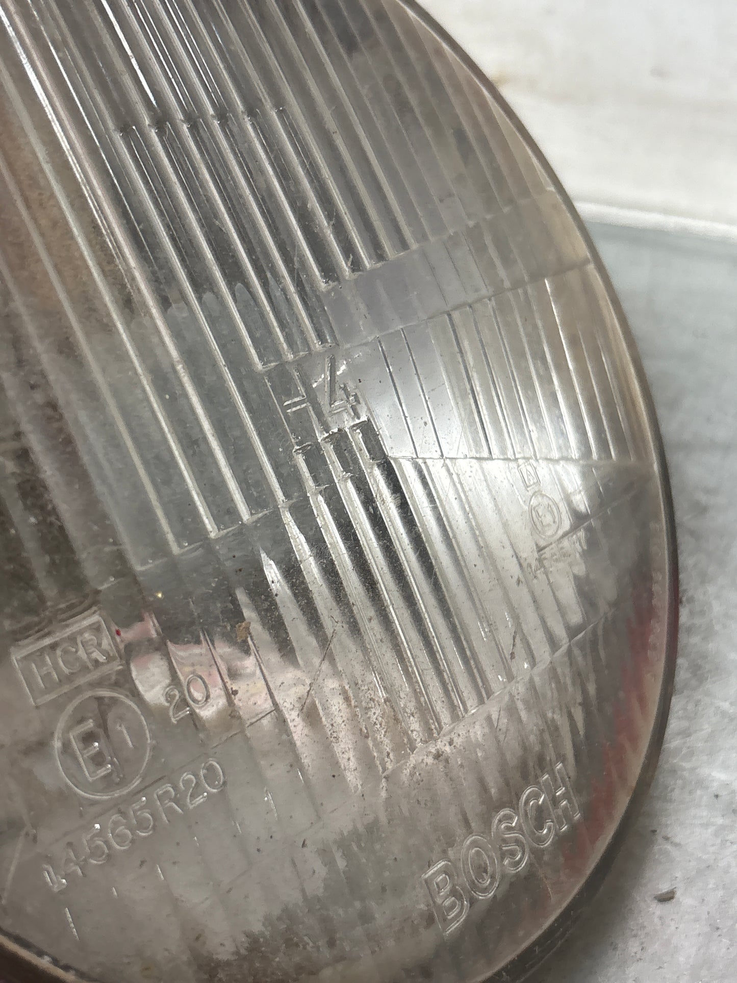 Porsche 924 / 944 Bosch H4 headlight, used 477941771 / 1305603018