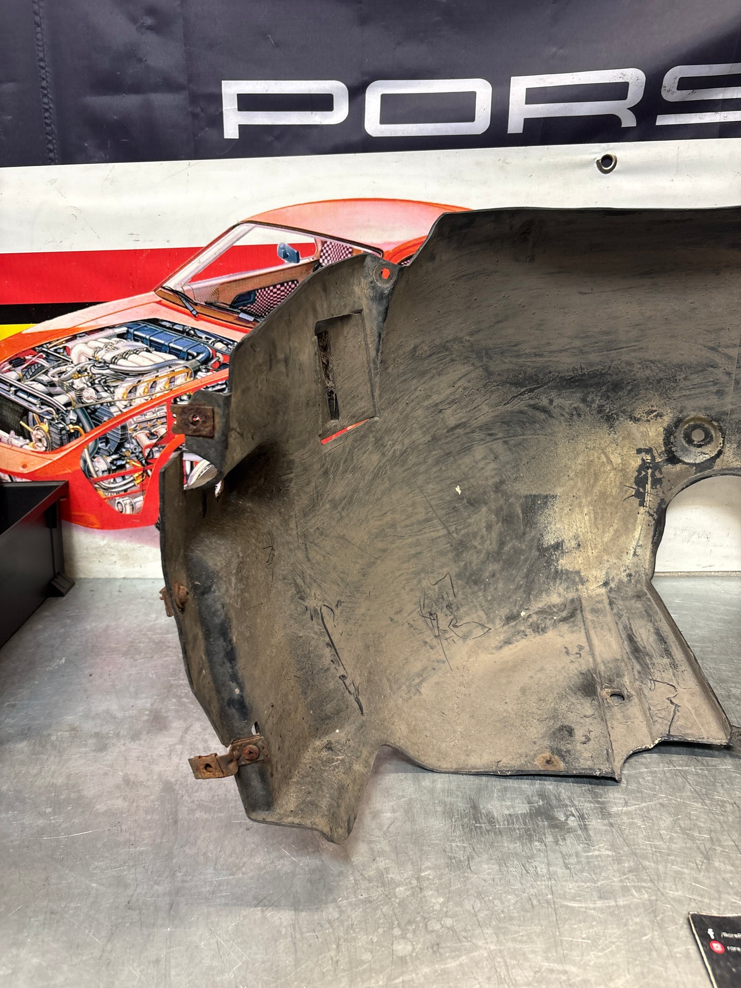 Porsche 944 from 85.5 wheel arch liner  Left, 94450438101 Used