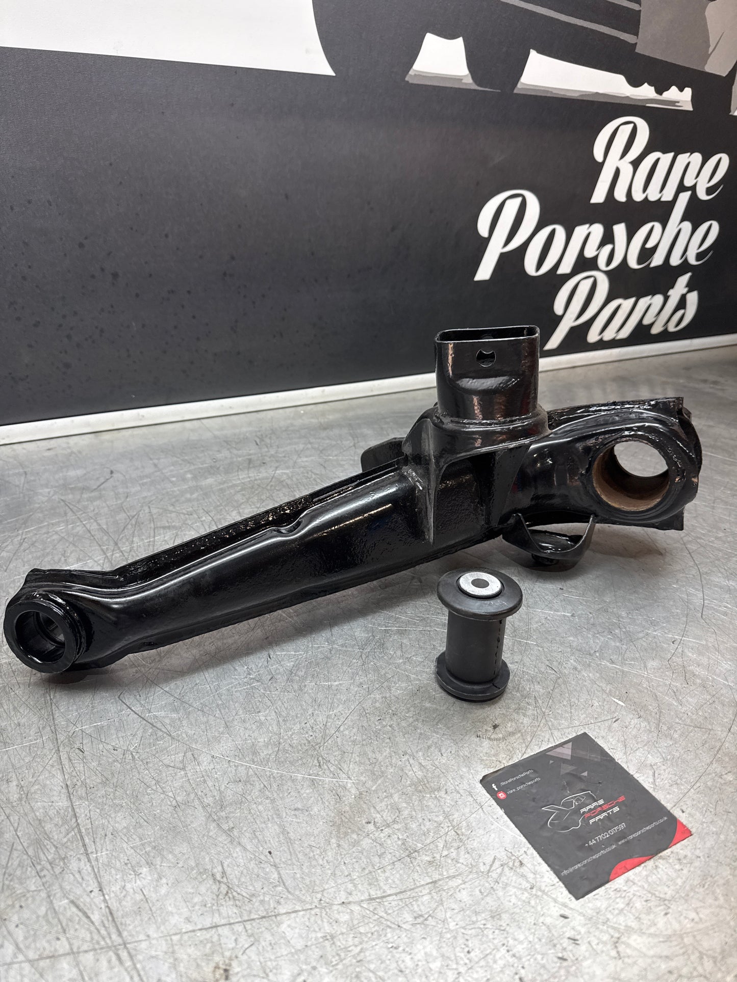 Porsche 924 944  -85.5 Rear left trailing arm, refurbished 94433102100