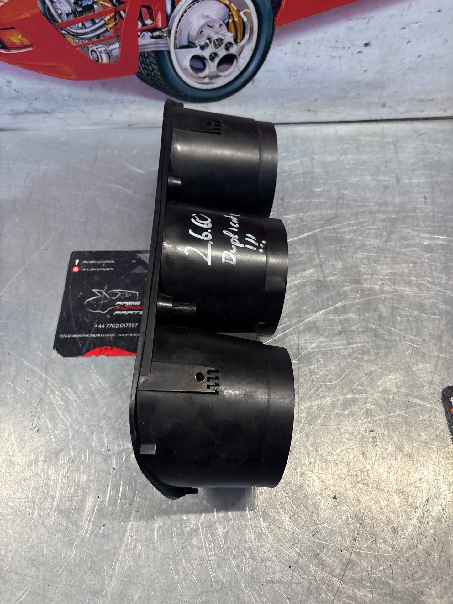 Porsche 944 dash binnacle dial panel speedo surround with high beam hole 477857283 silver, used