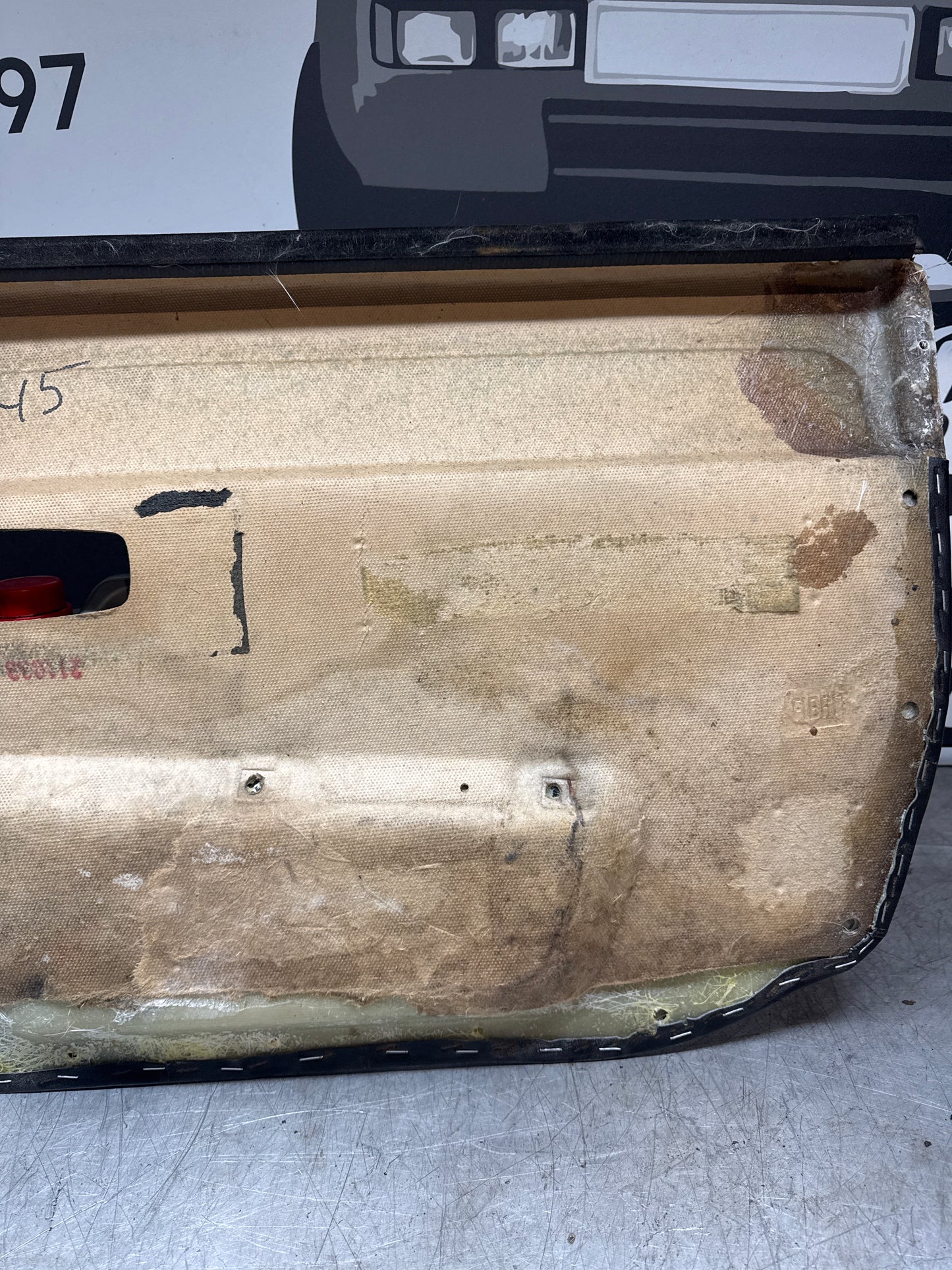 Porsche 924/ Early 944 black RHD Left door card. Fibreglass repaired. 477867012