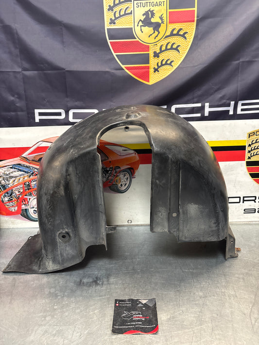 Porsche 944 from 85.5 wheel arch liner  Left, 94450438101 Used